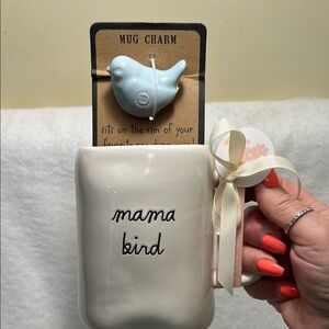 RAE DUNN Mama Bird Mug with Blue Bird Charm that sits around the rim.